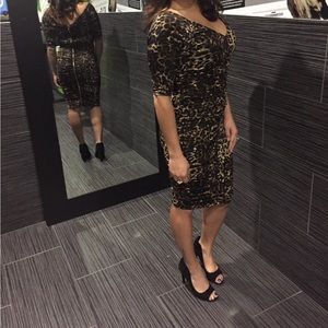 Jennifer Lopez leopard/cheetah print dress  Size small Body-con